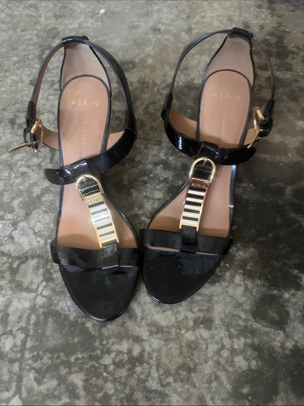 AERIN Black Patent Leather T-Strap Sandals with Gold Hardware